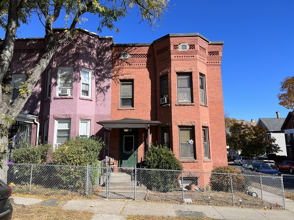 a front view of a multi story residential apartment building