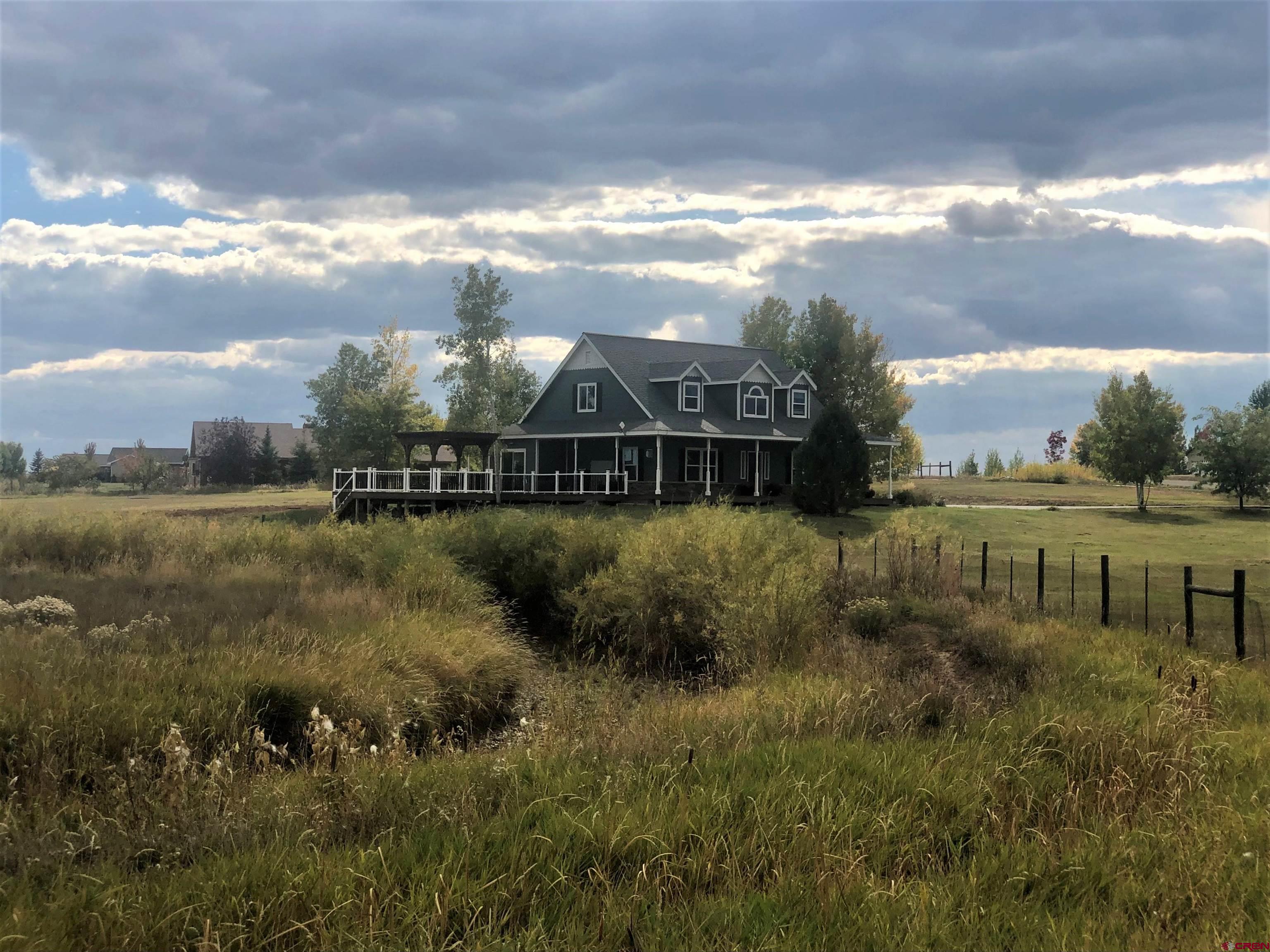 a view of a lake with a building in the background