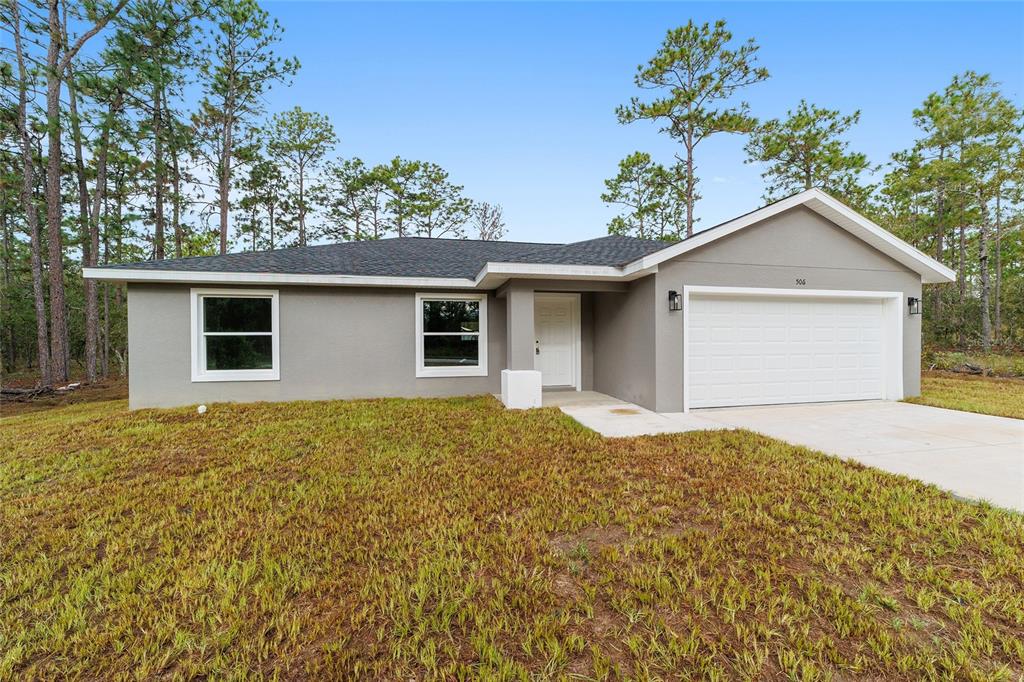 a house with trees in the background