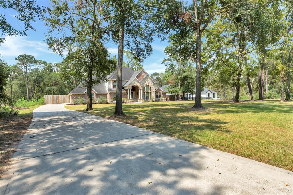 a view of a house with a big yard