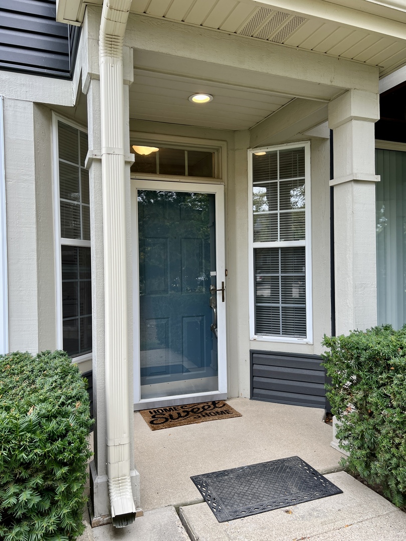 a view of house and front door