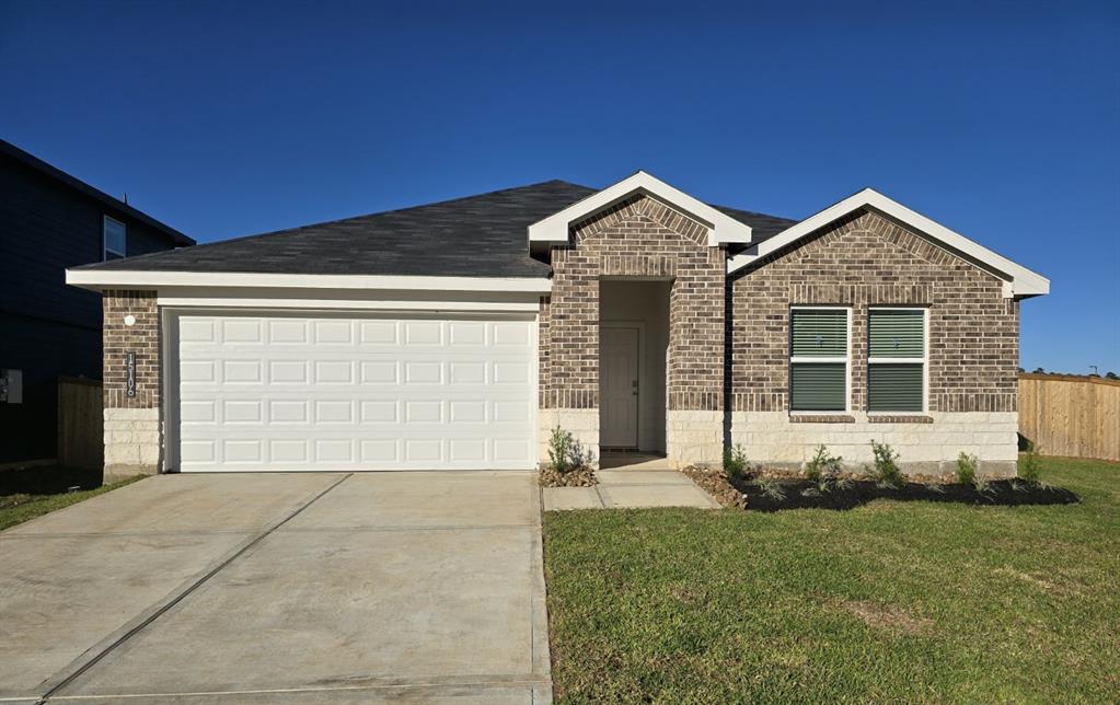 Lovely curb appeal with beautiful stone and brick