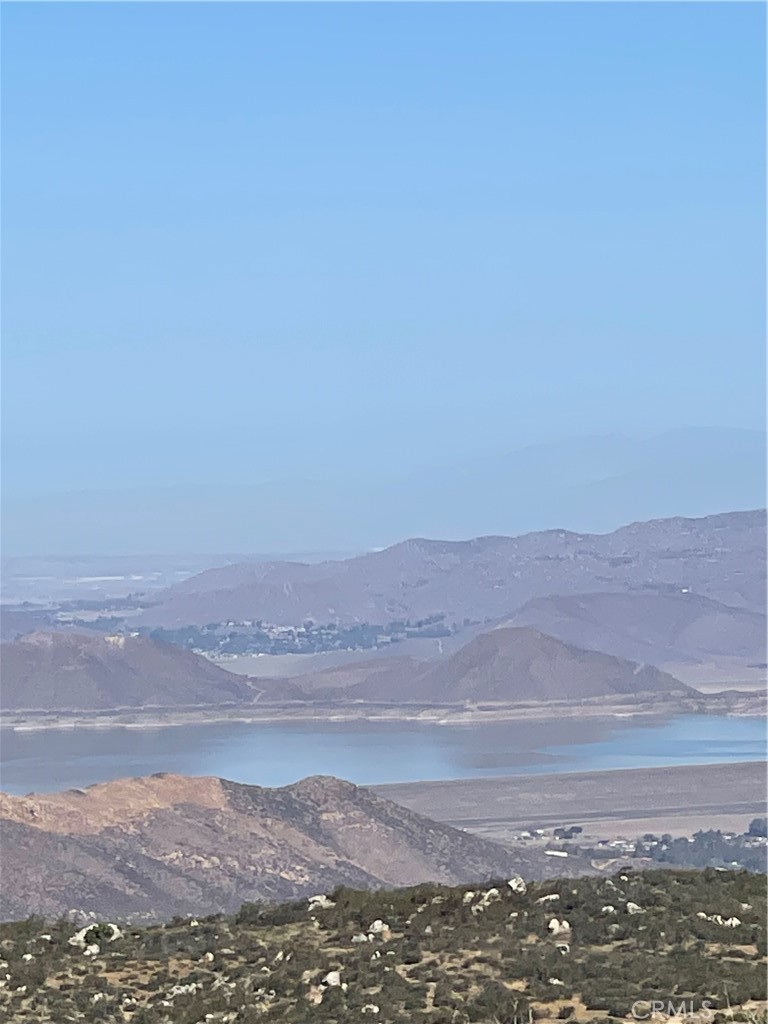 a view of ocean and a mountain