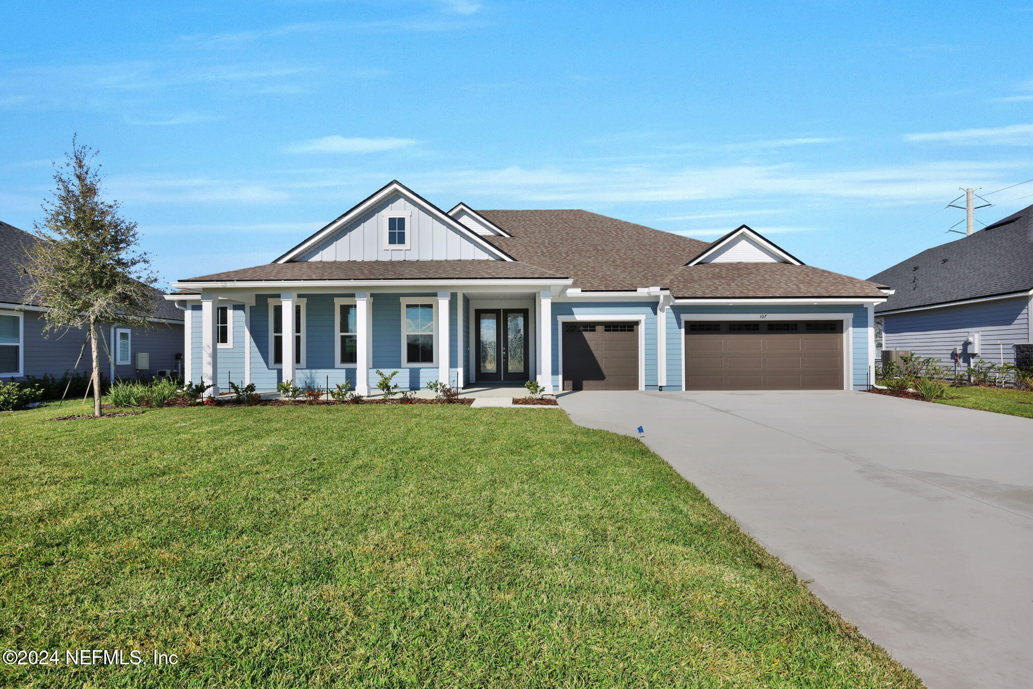 front view of a house with a yard