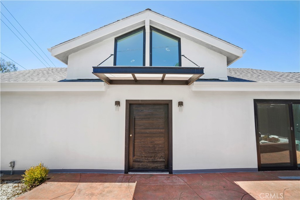 a front view of a house with entryway