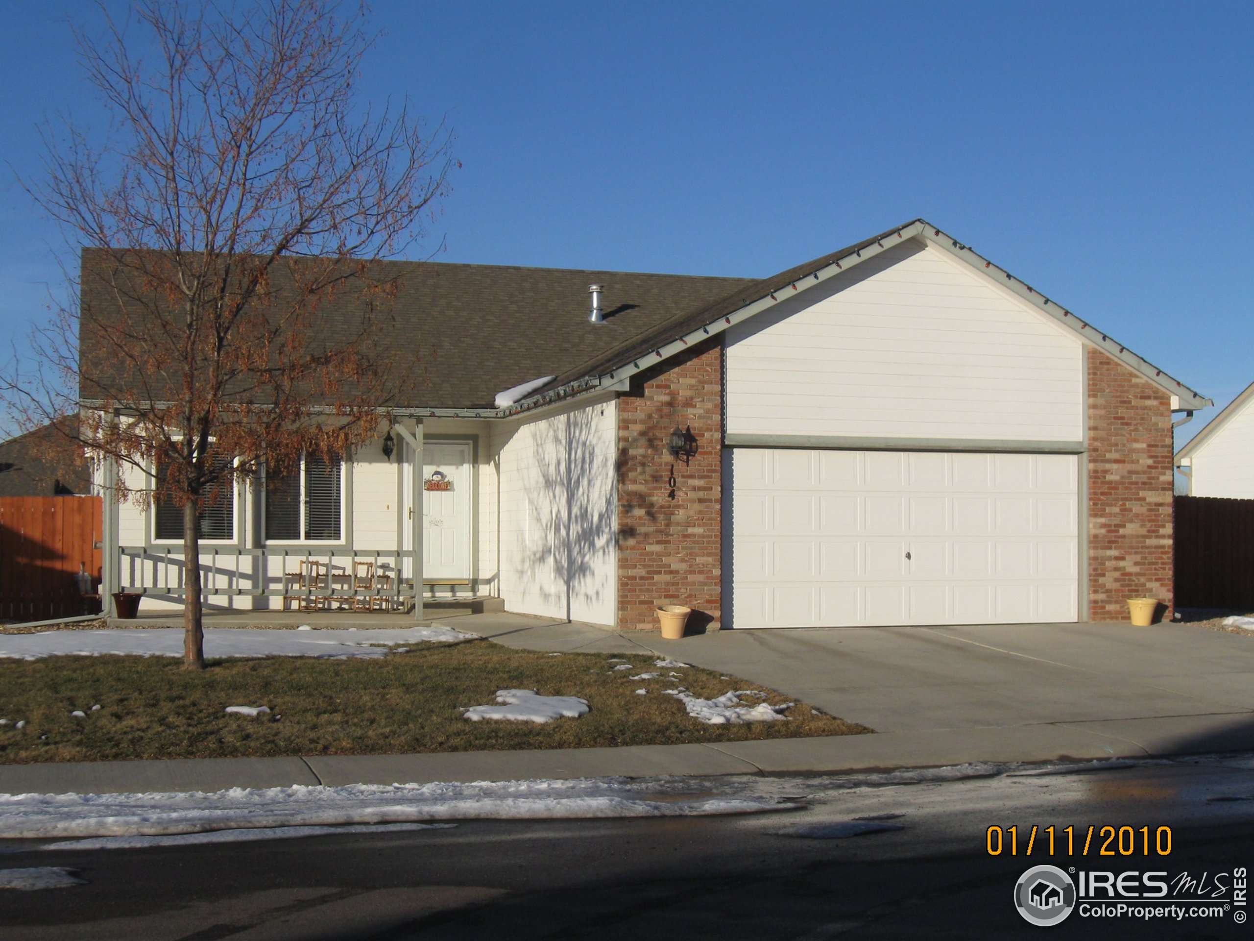 a view of a house with a street