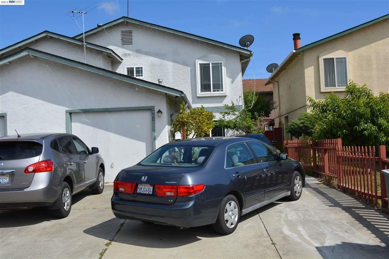 a car parked in front of a house