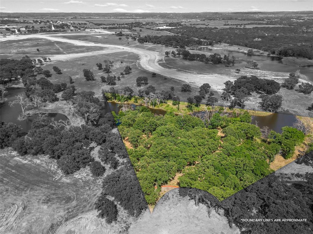 an aerial view of beach and residential space