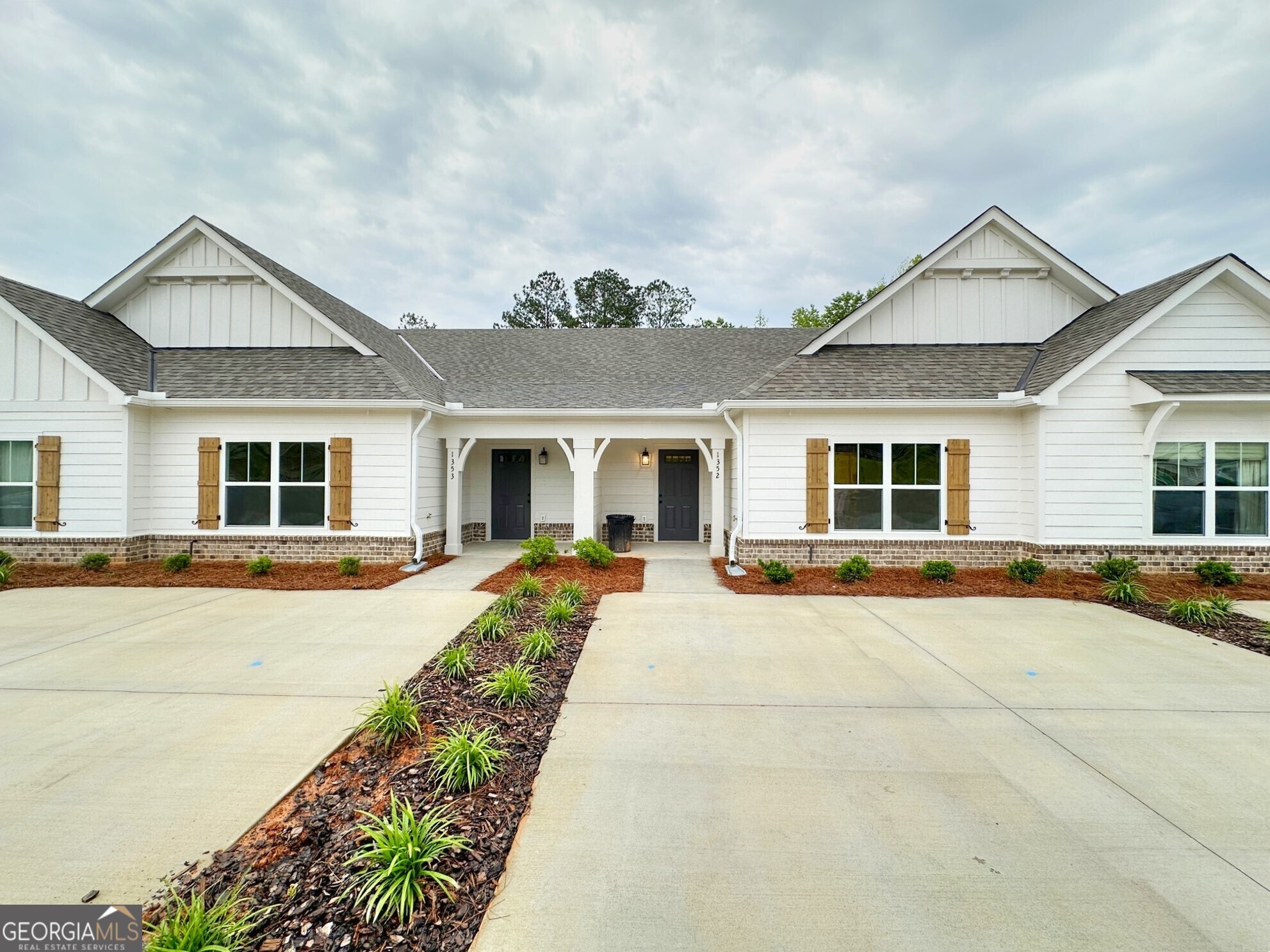 front view of a house with a patio