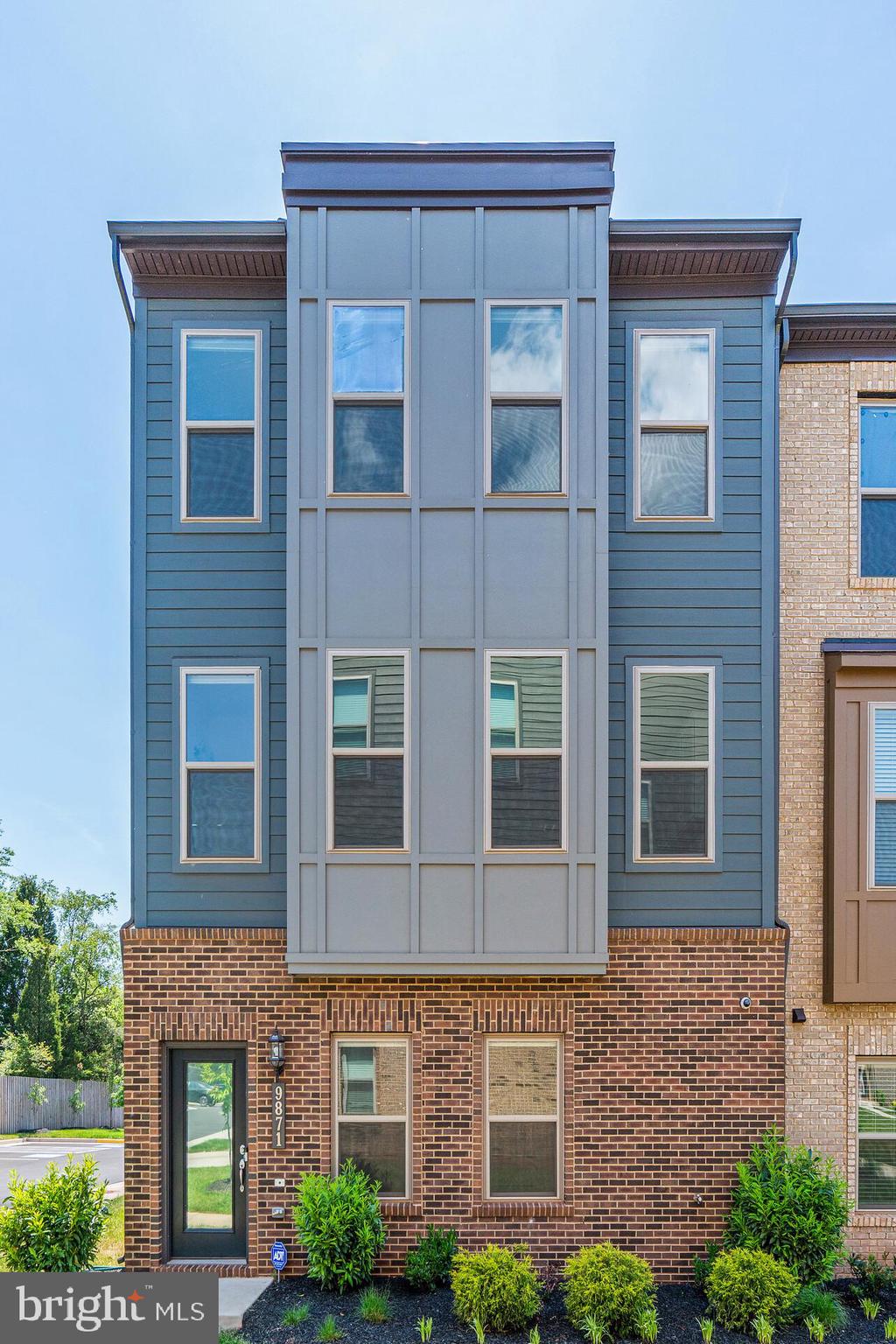 a brick building with a lot of windows