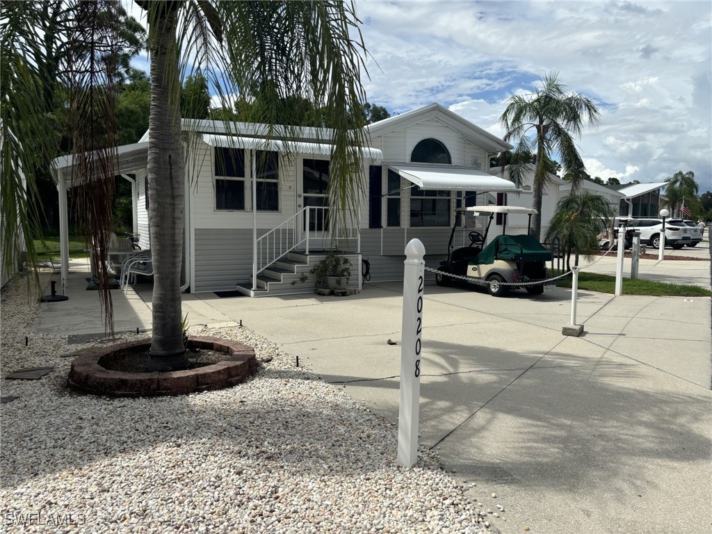 a view of a house with a park