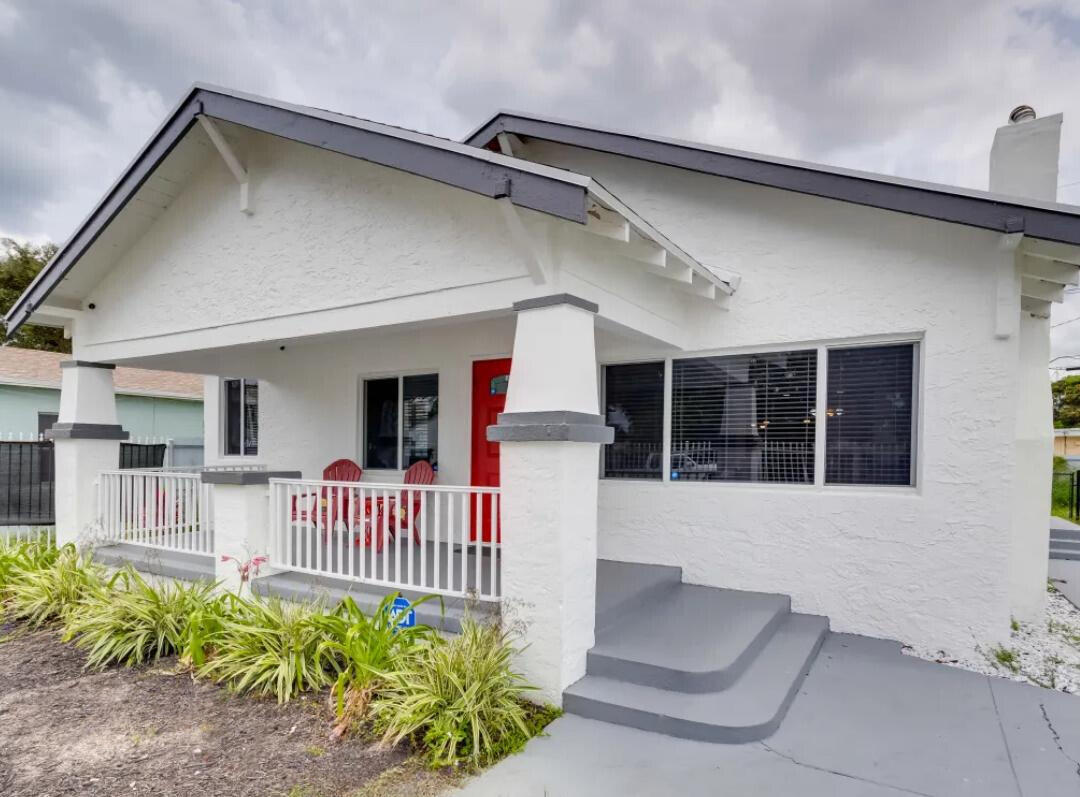 a front view of a house with a porch