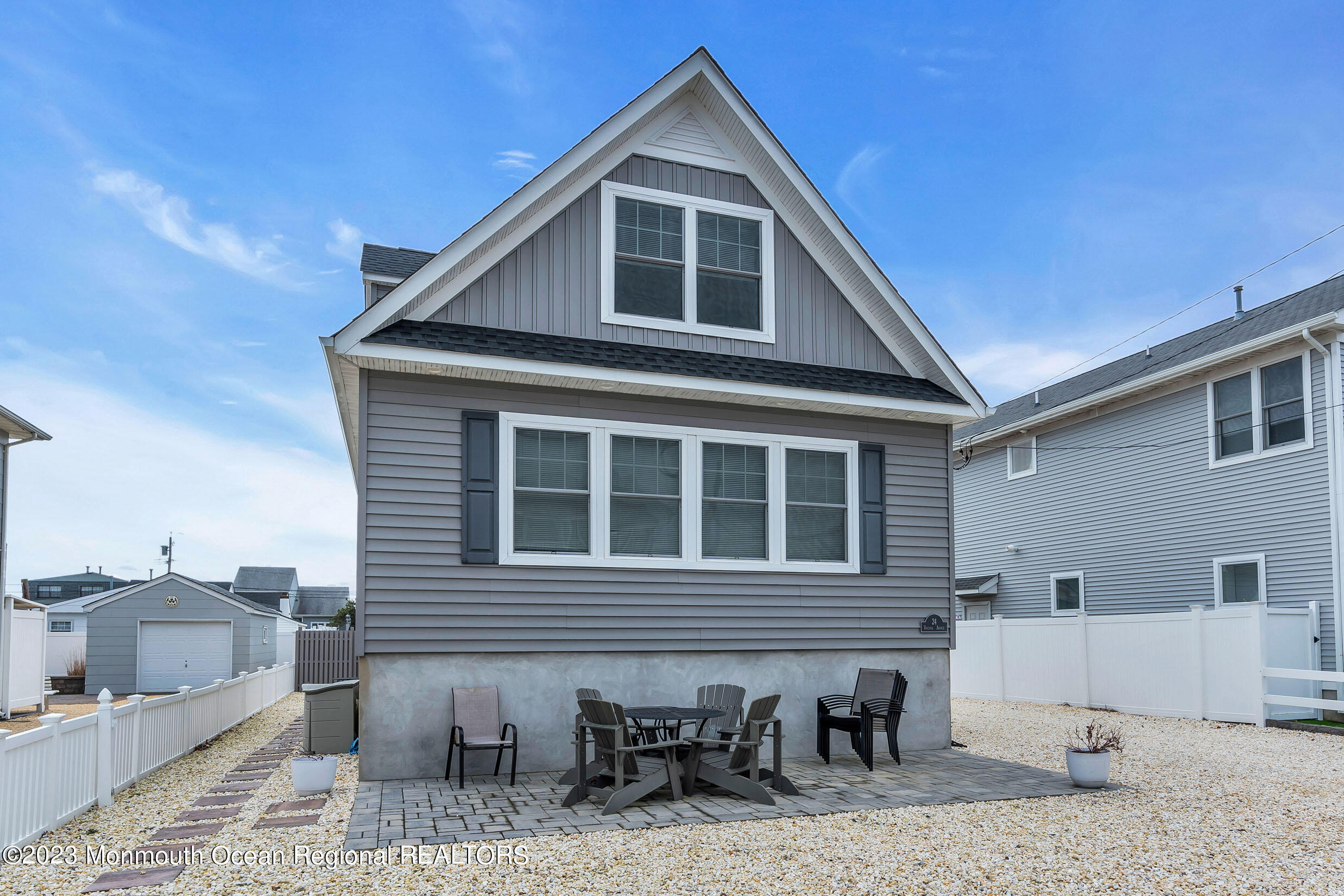 a front view of a house with parking space