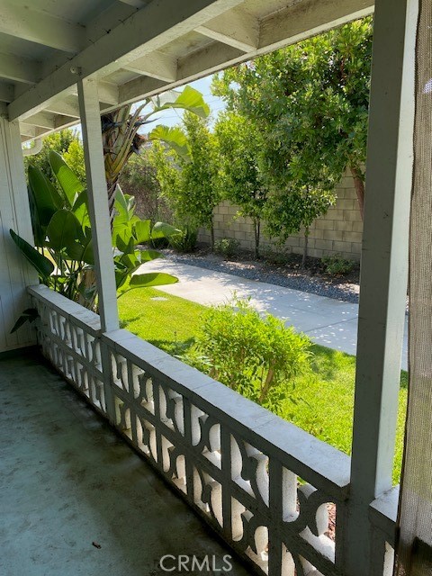 a view of swimming pool from a balcony