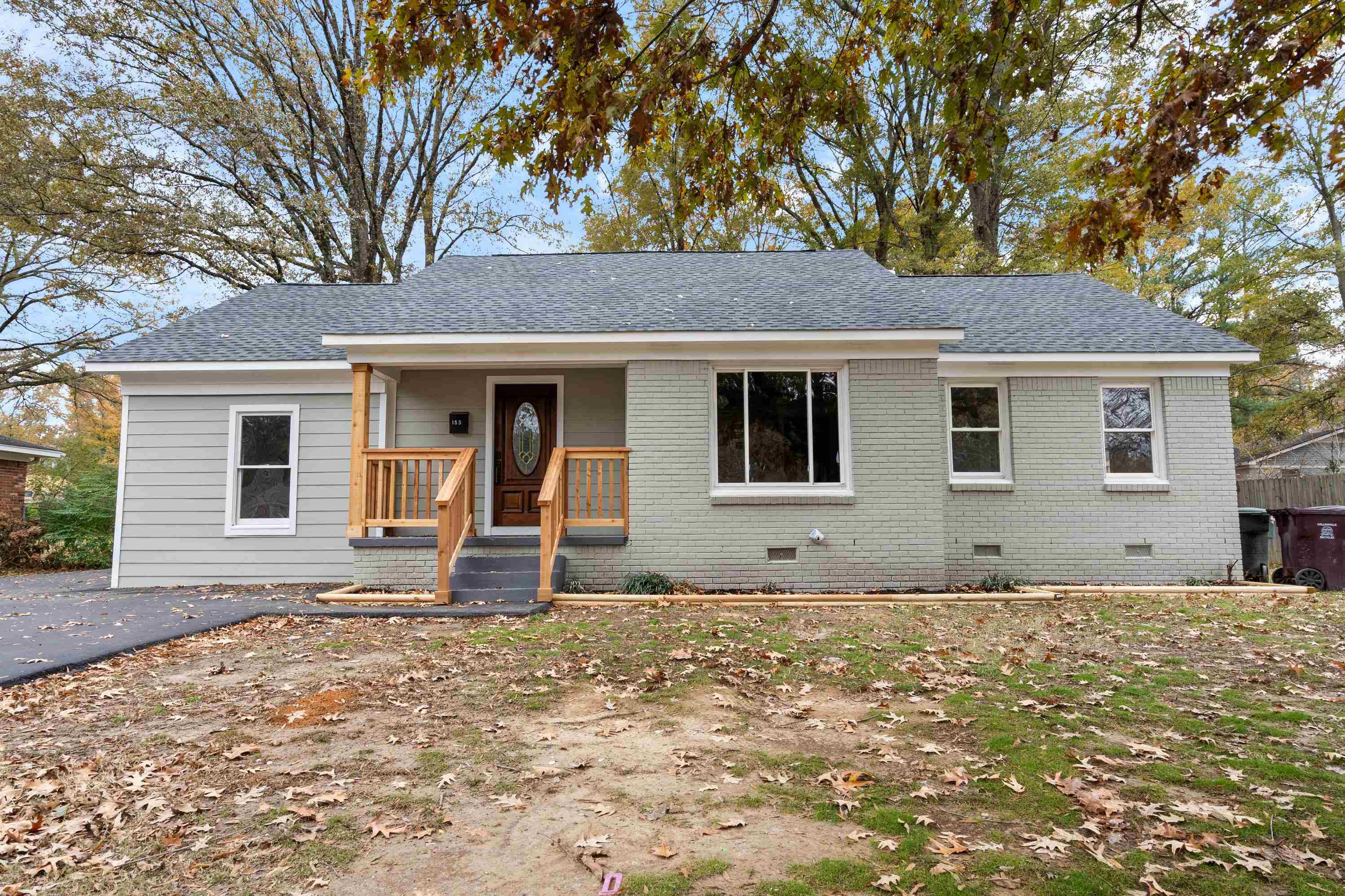 Ranch-style home featuring covered porch