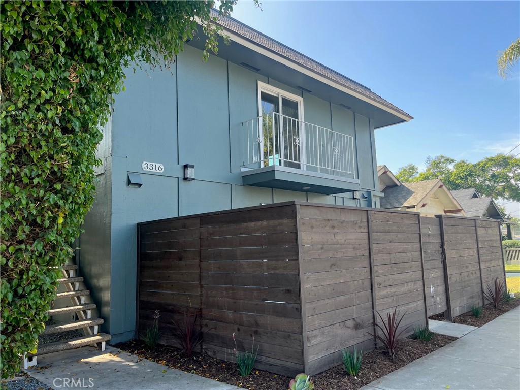 a view of outdoor space and front view of a house