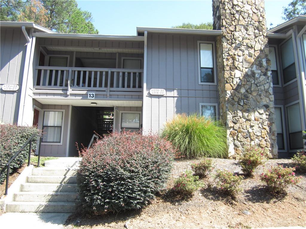 a view of front door and yard of the house