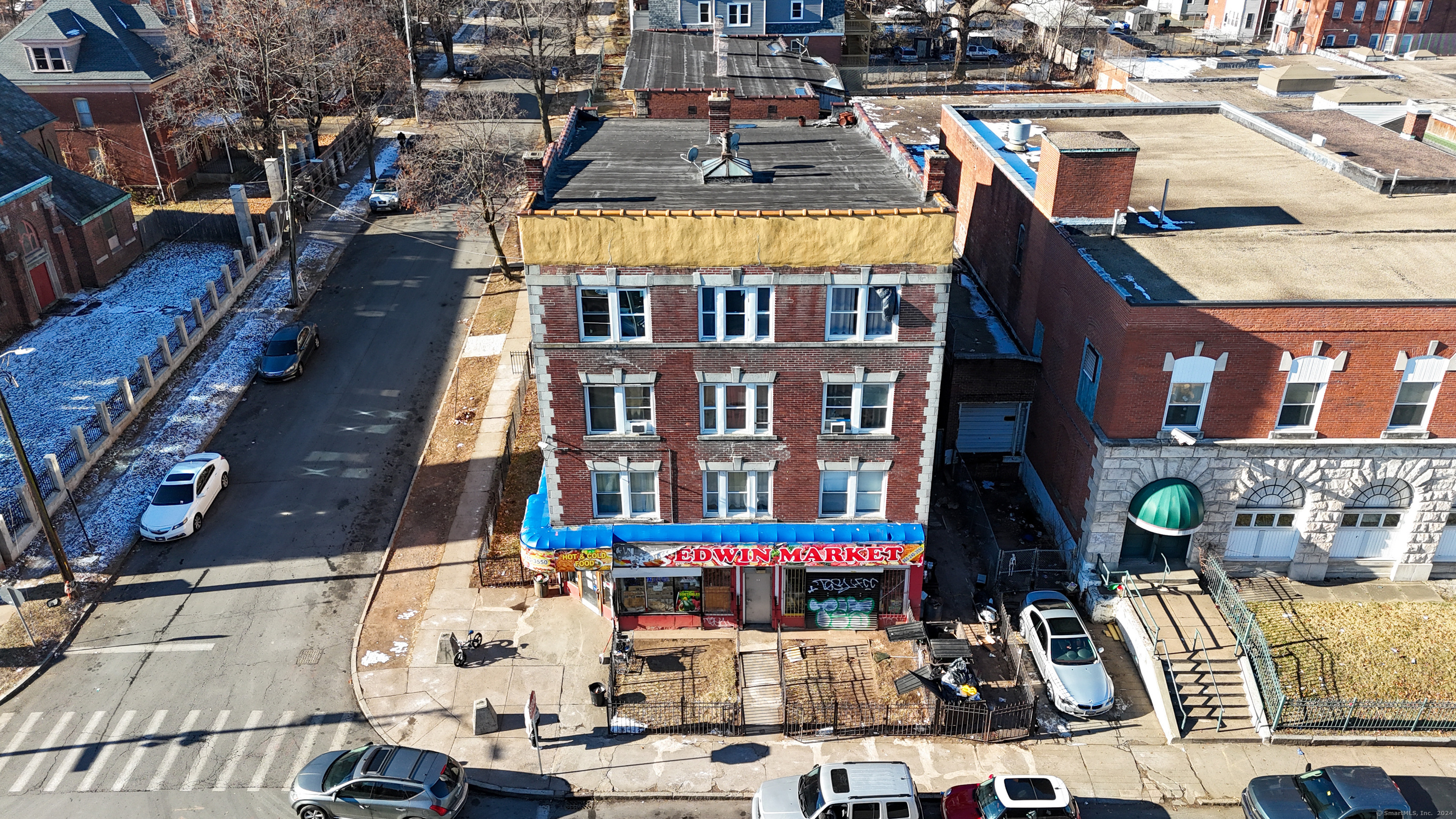 a front view of a building with street view