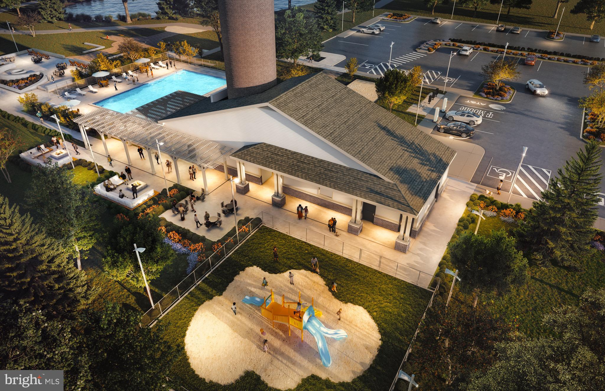 an aerial view of a house a yard basket ball court and outdoor seating