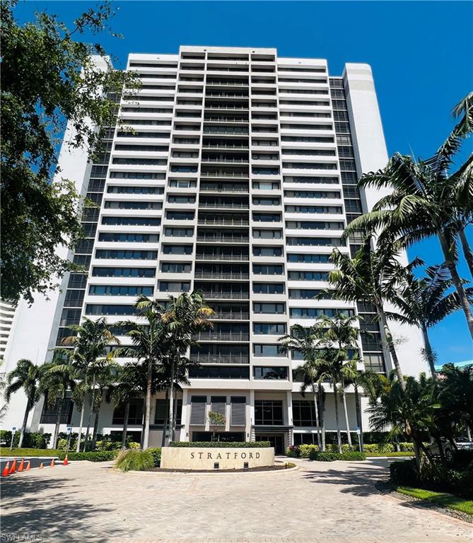 a front view of a building with street view