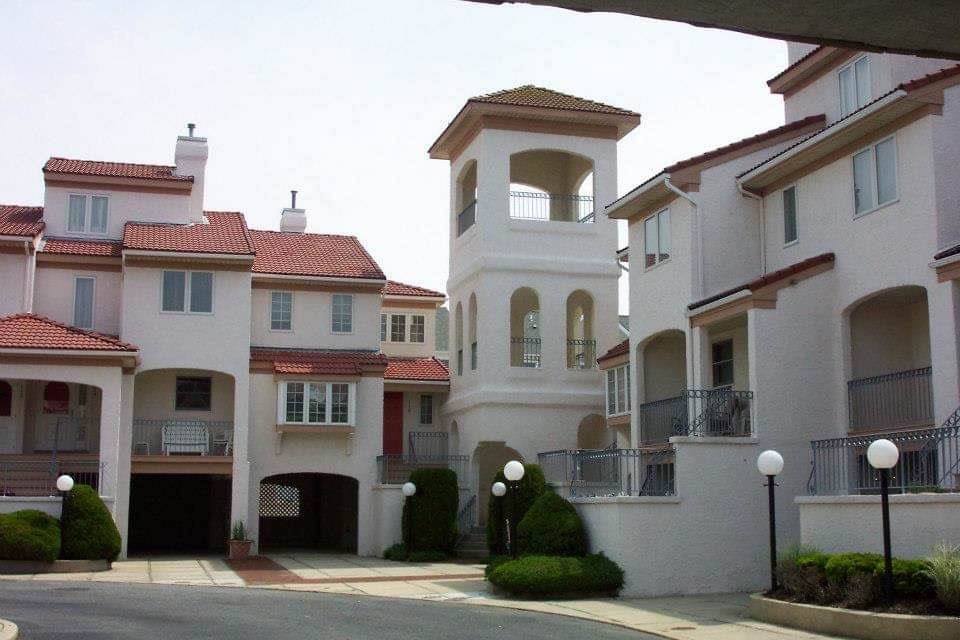 a front view of a multi story residential apartment building