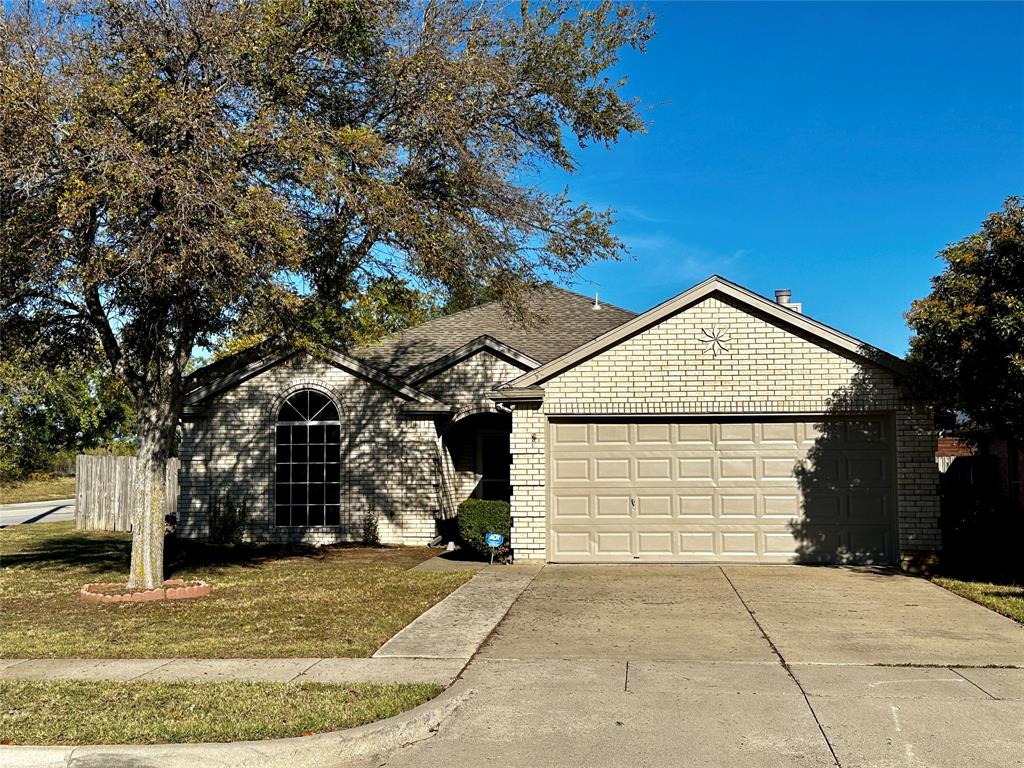 a view of a house with a garage