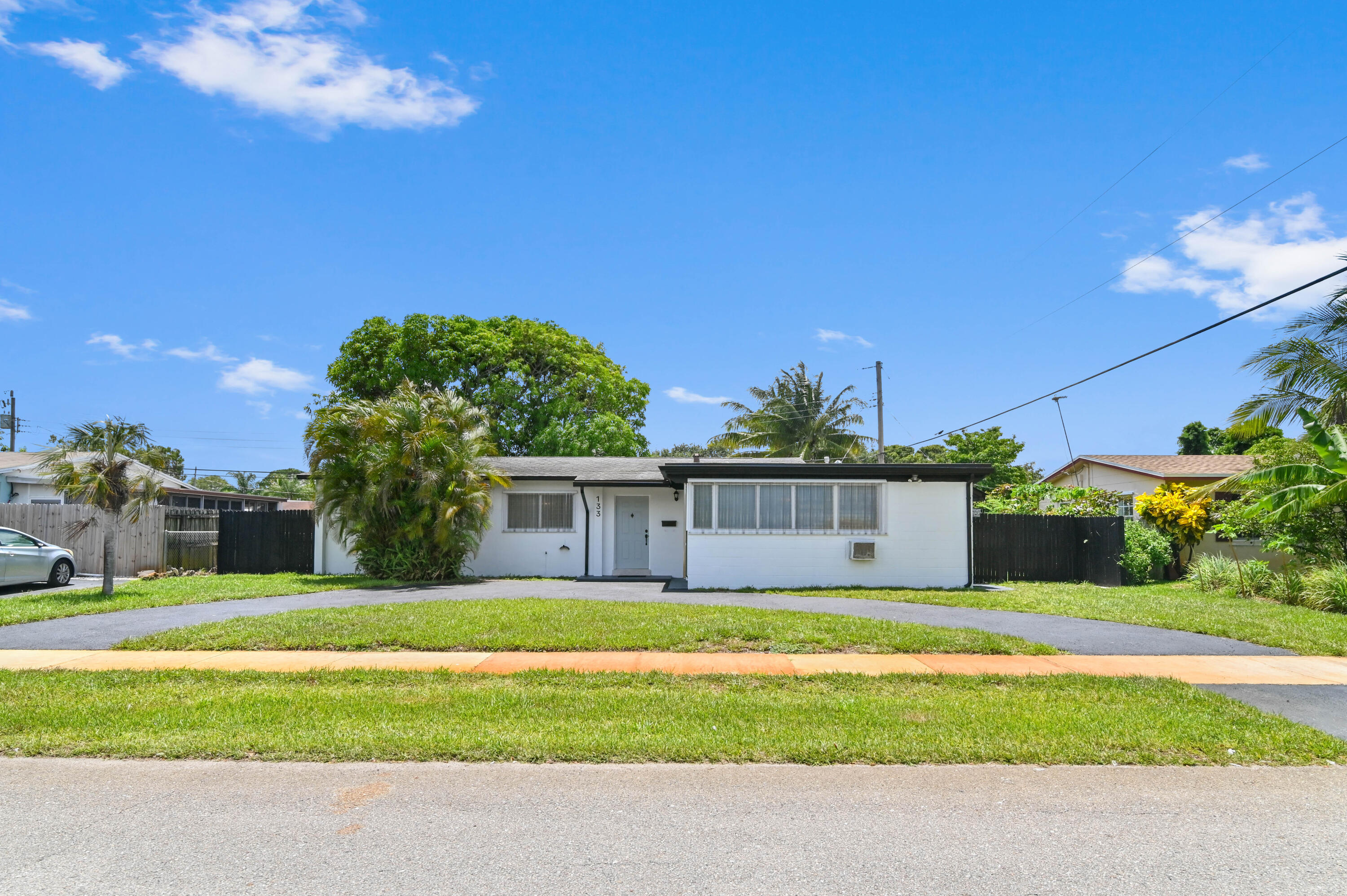 a view of a house with a big yard