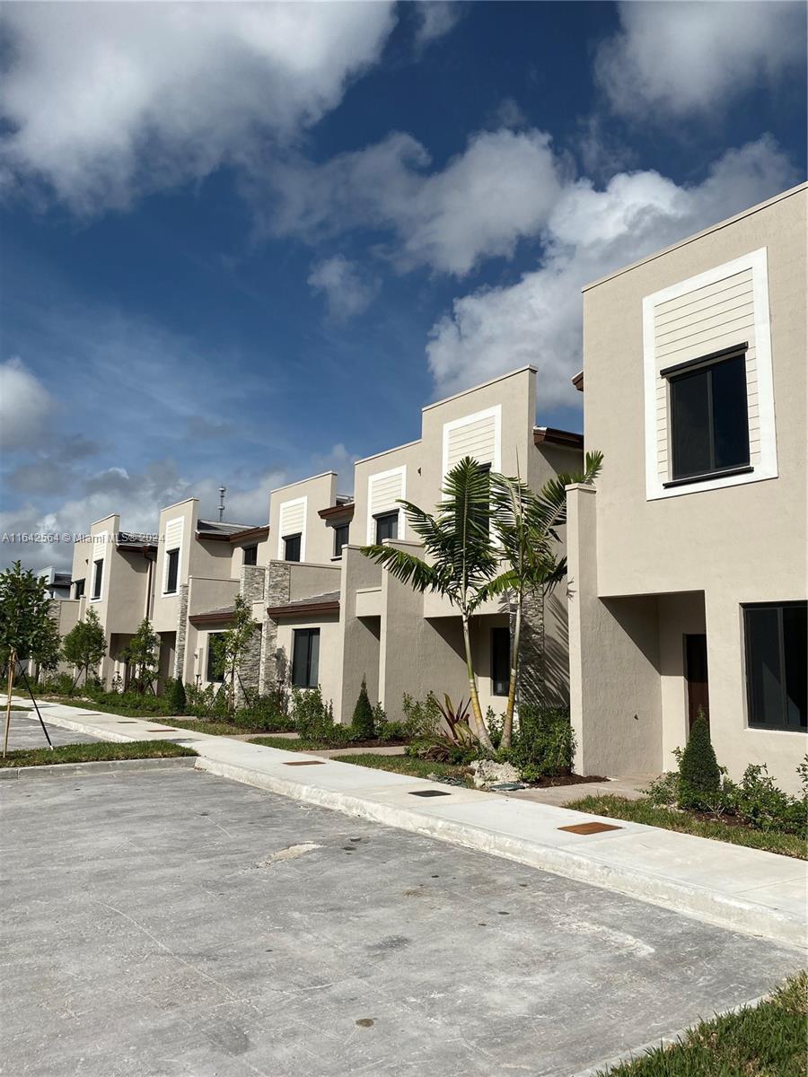 a front view of a building with street