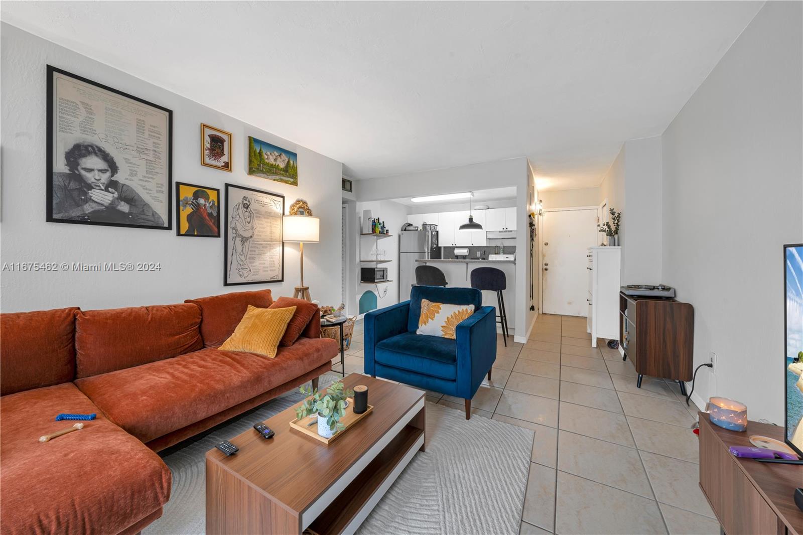 a living room with furniture and a couch