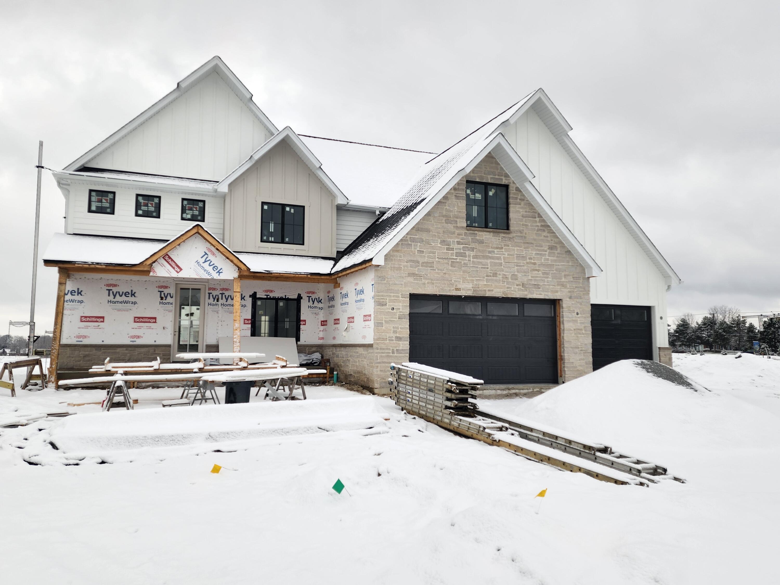 a view of a house with wooden walls and a fireplace