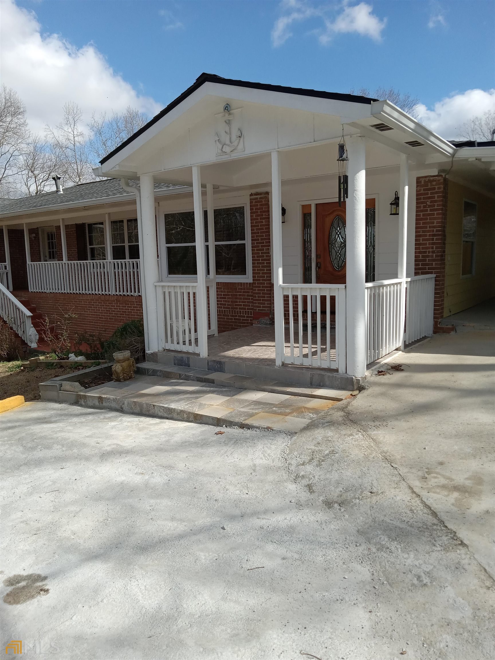 a view of a house with a fence