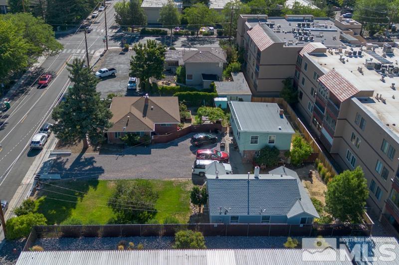 an aerial view of a house with a garden