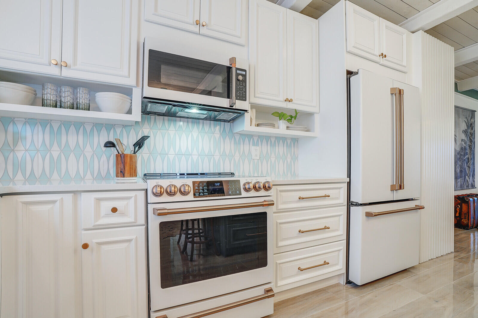 a kitchen with cabinets stainless steel appliances and wooden cabinets