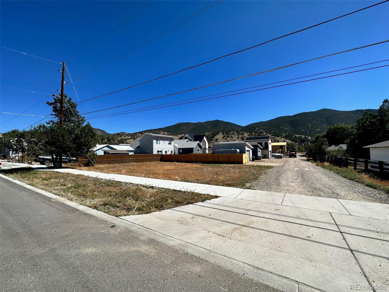 a view of a street with a houses