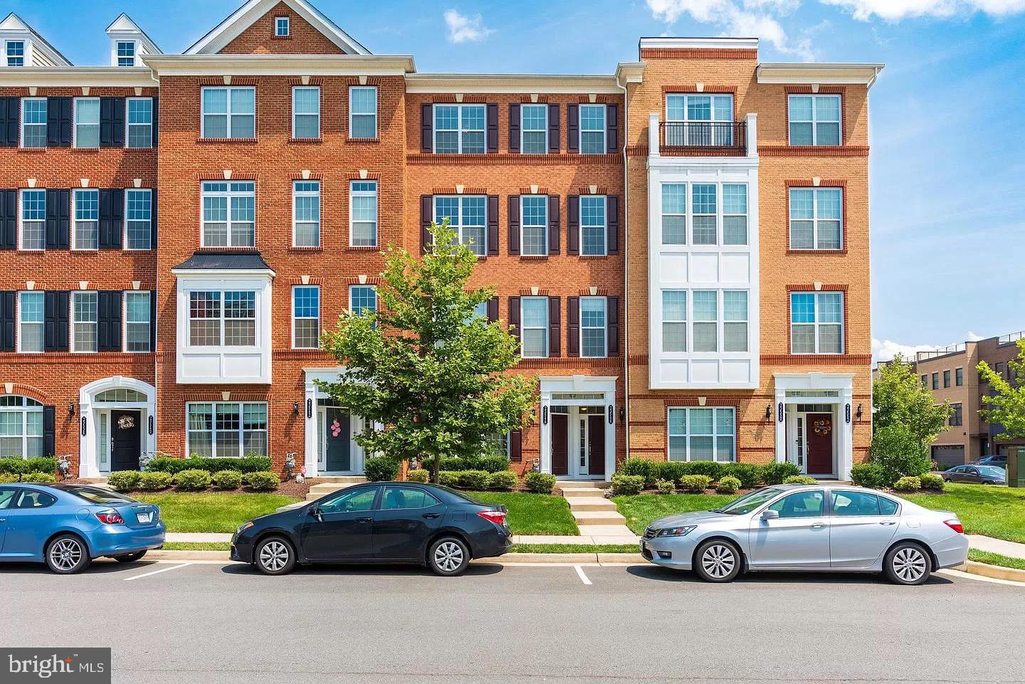 a cars parked in front of a building in the street