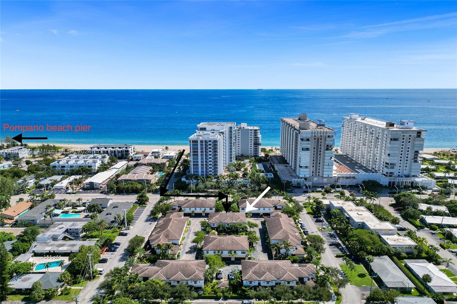 an aerial view of multiple house