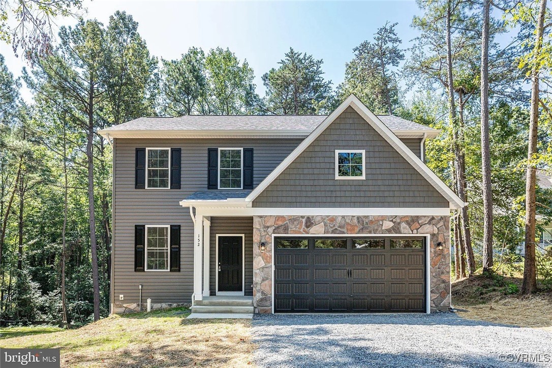 View of front of house featuring a garage