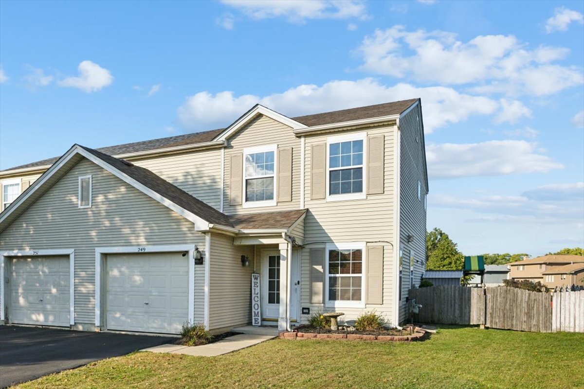 a front view of house with yard