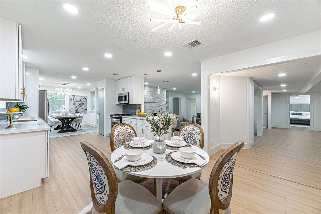 a view of a dining room with furniture