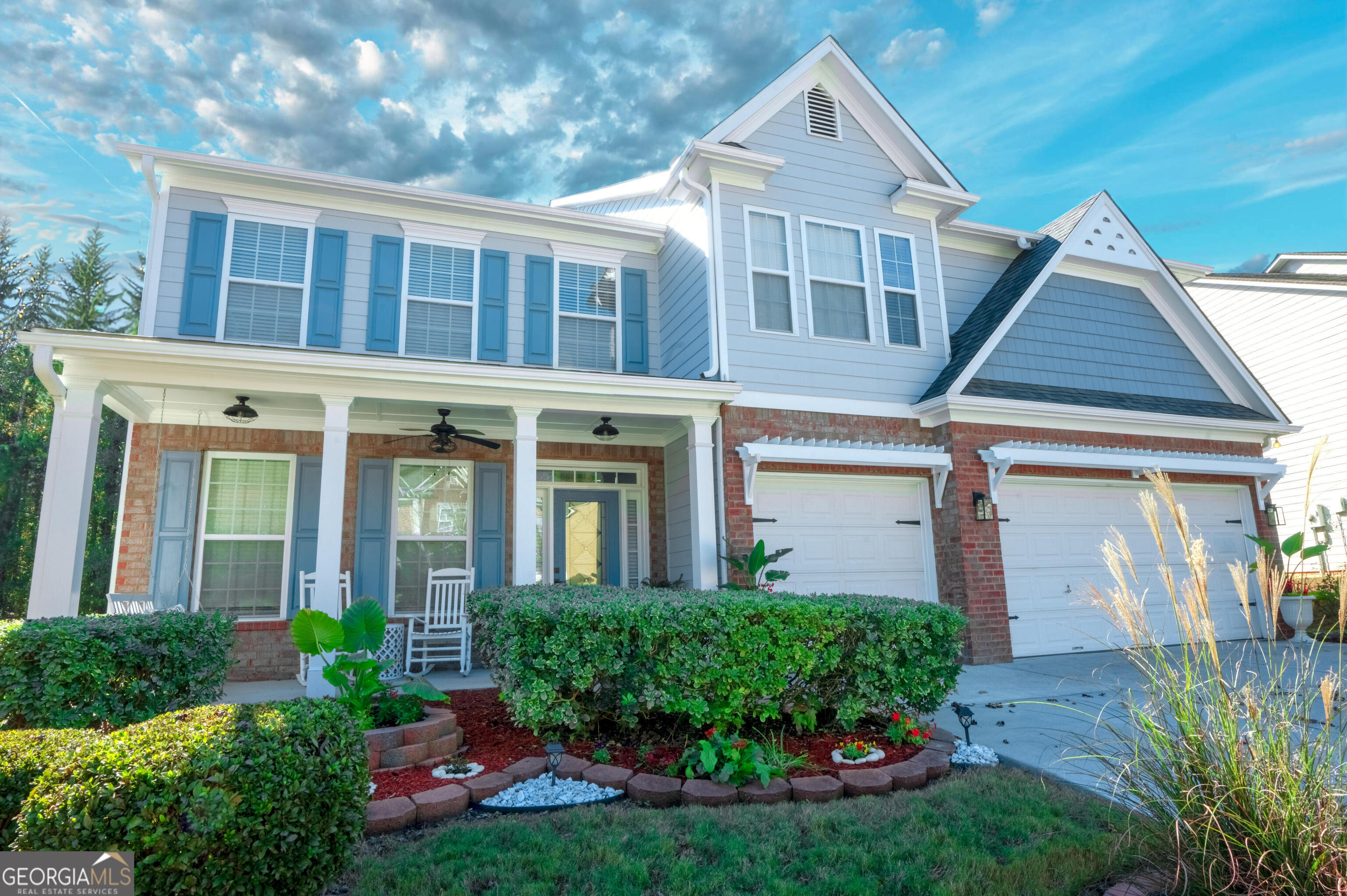 front view of a house with a yard