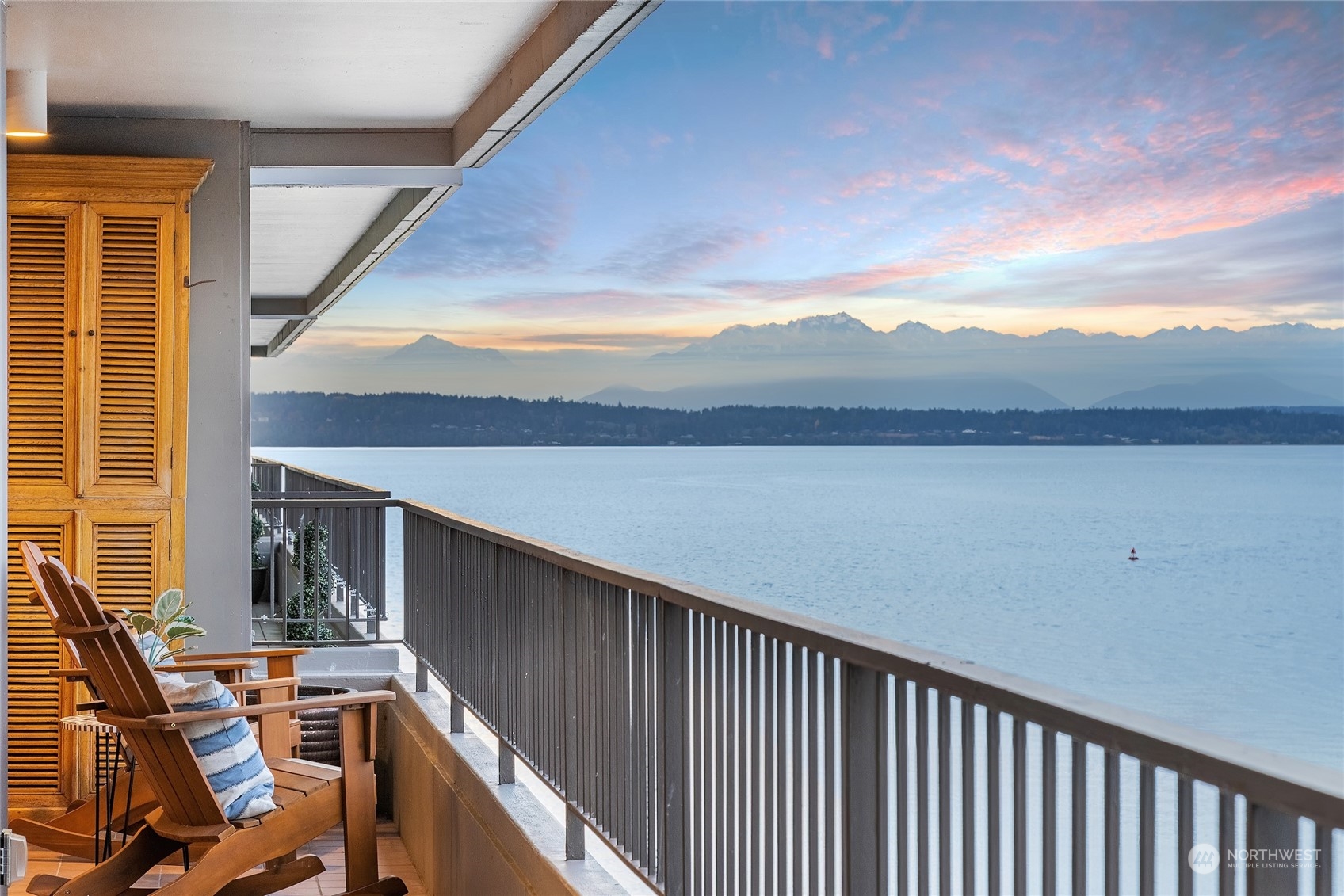 a view of a balcony with an outdoor space