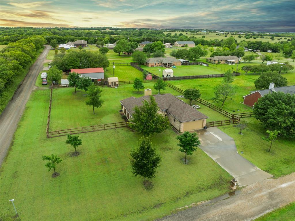 a view of a lake with a yard