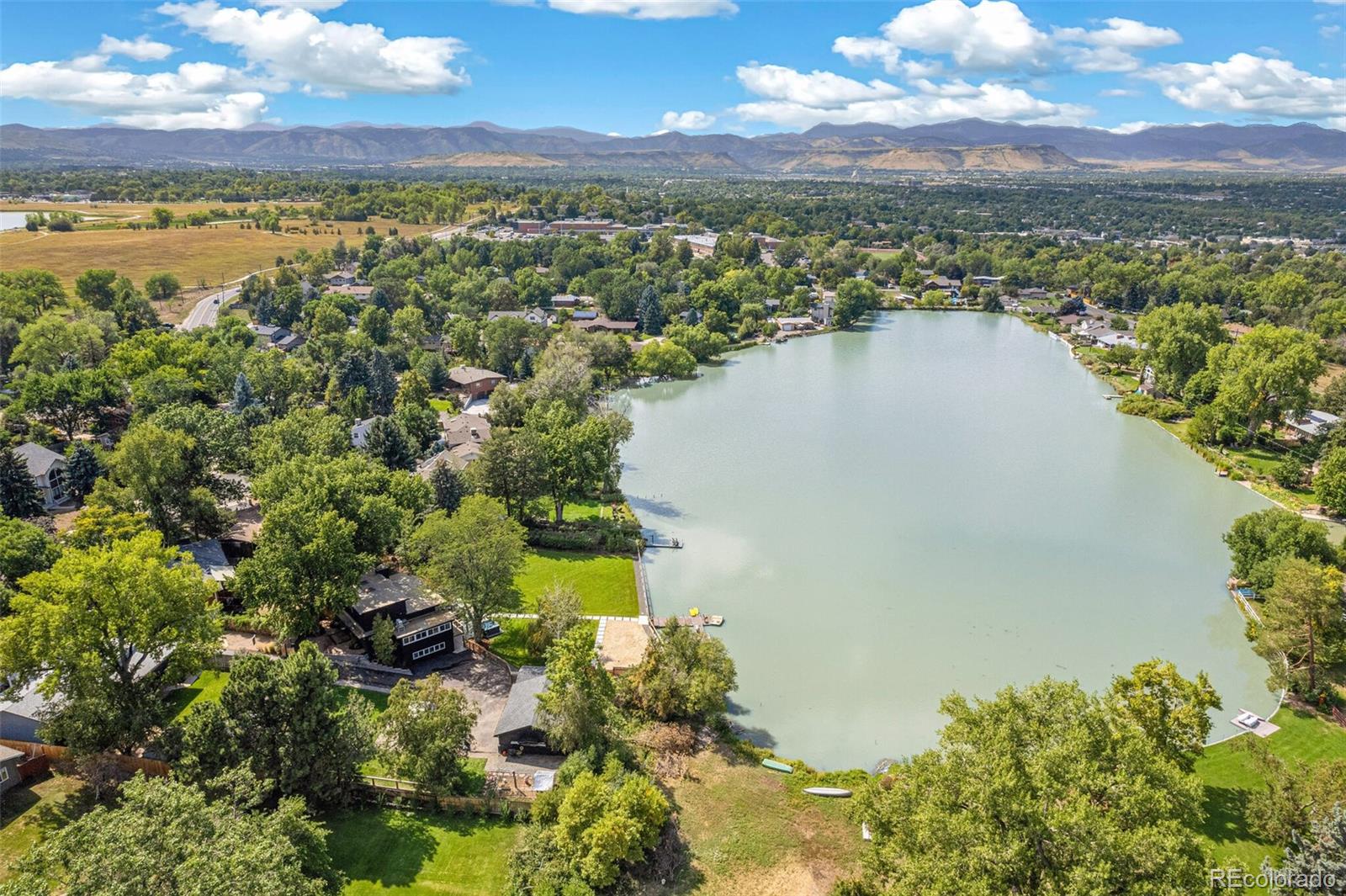 a view of a lake with a city