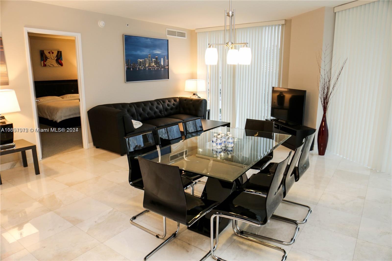 a view of a dining room with furniture