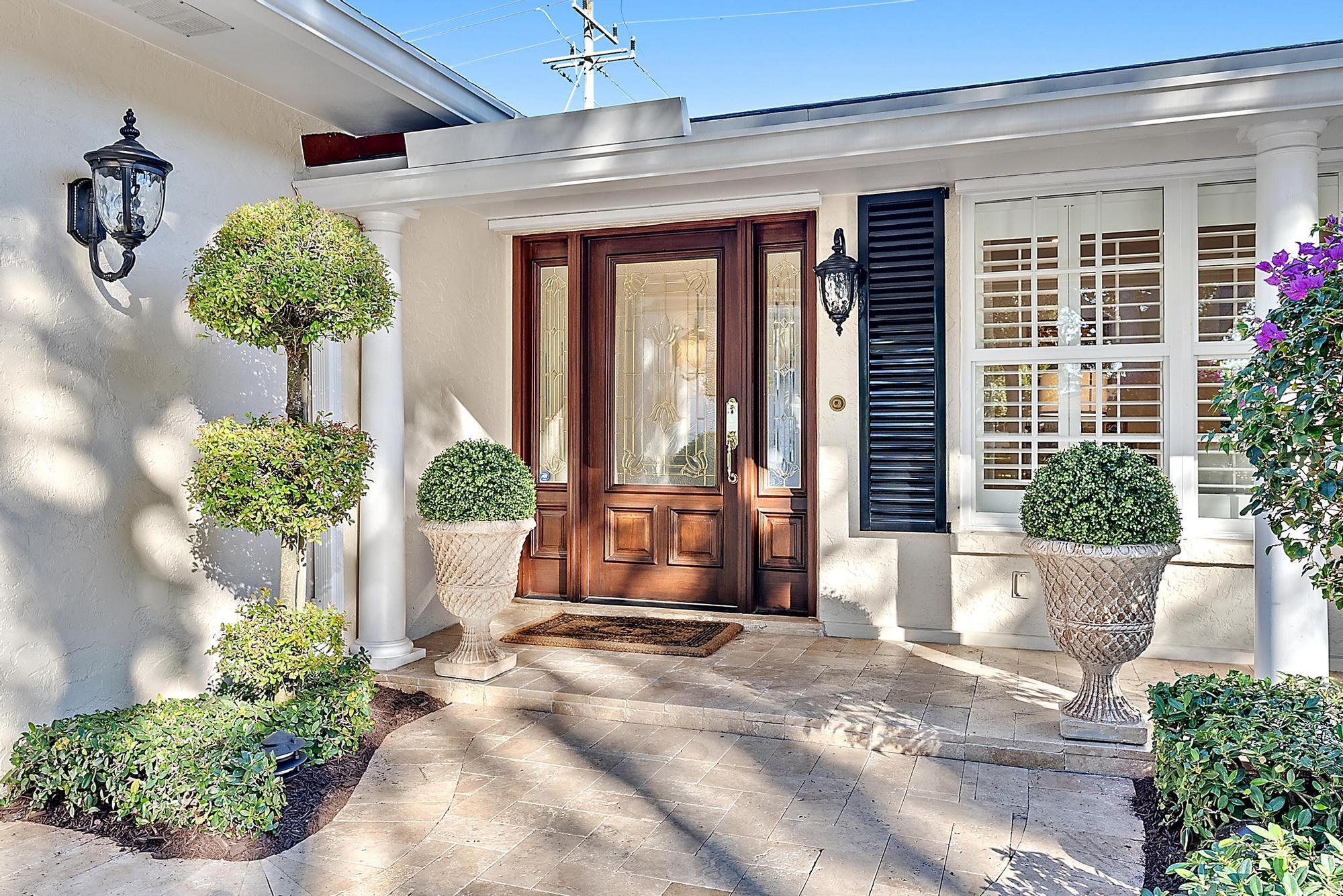 a view of a entryway door front of house