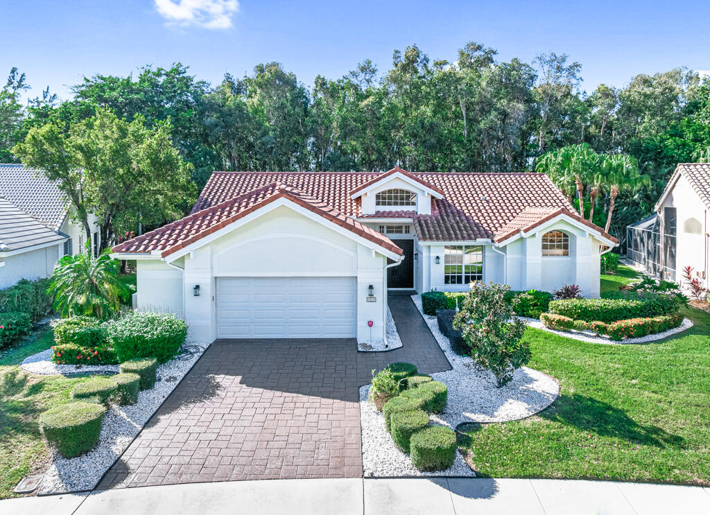 a aerial view of a house with garden