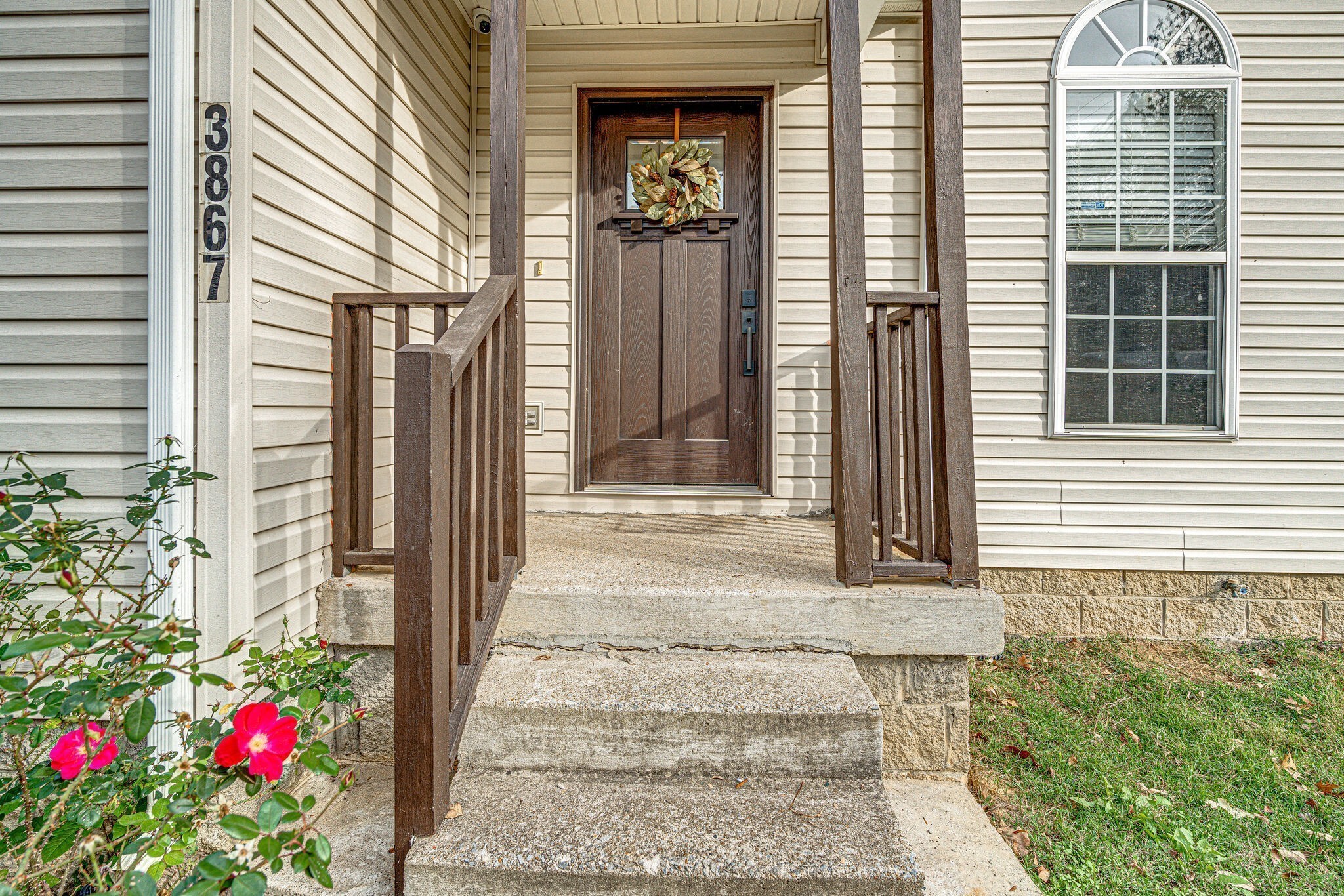 a front view of a house with a porch