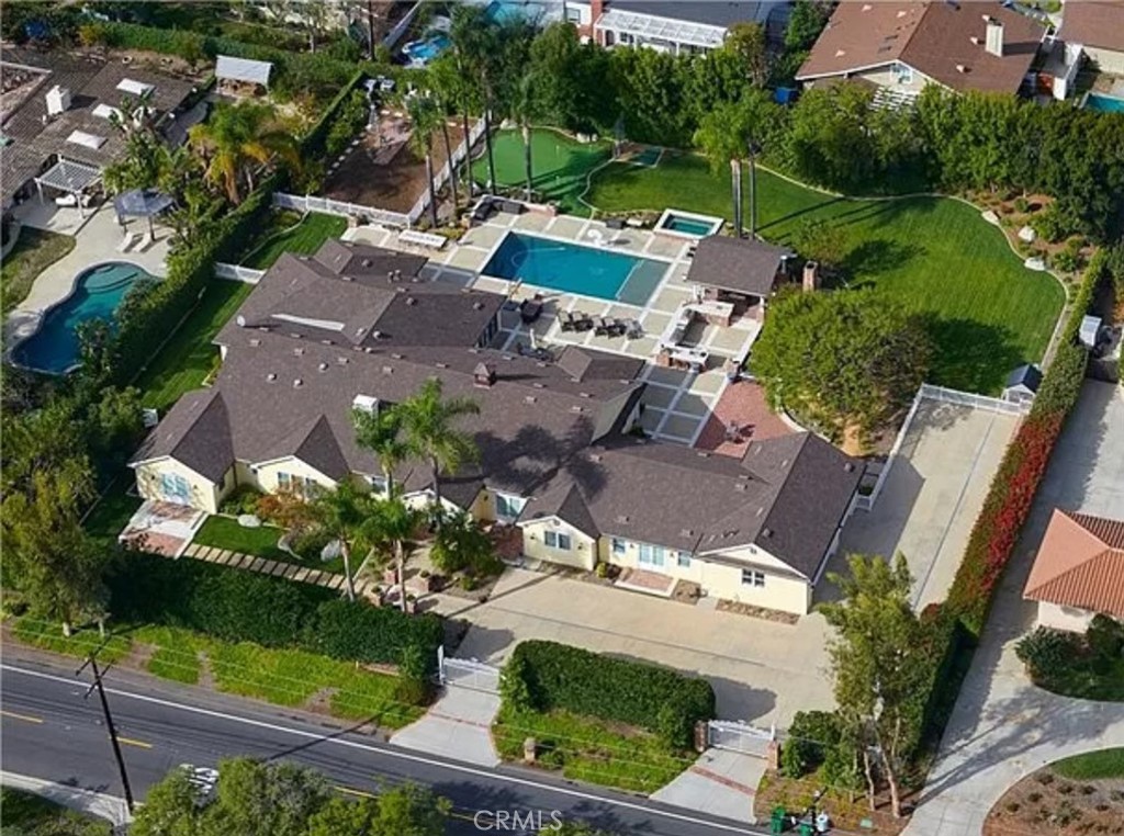 an aerial view of a house with a garden