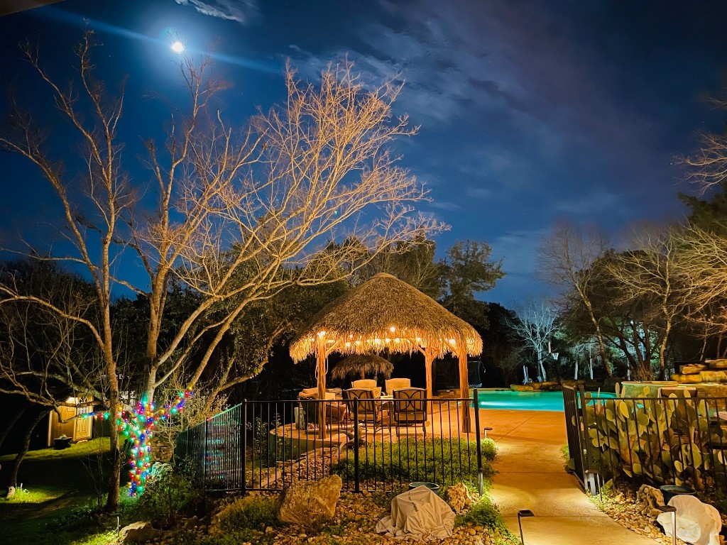 a view of a swimming pool with a patio