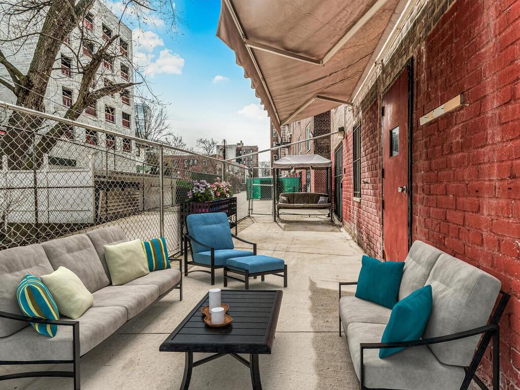 a balcony with furniture